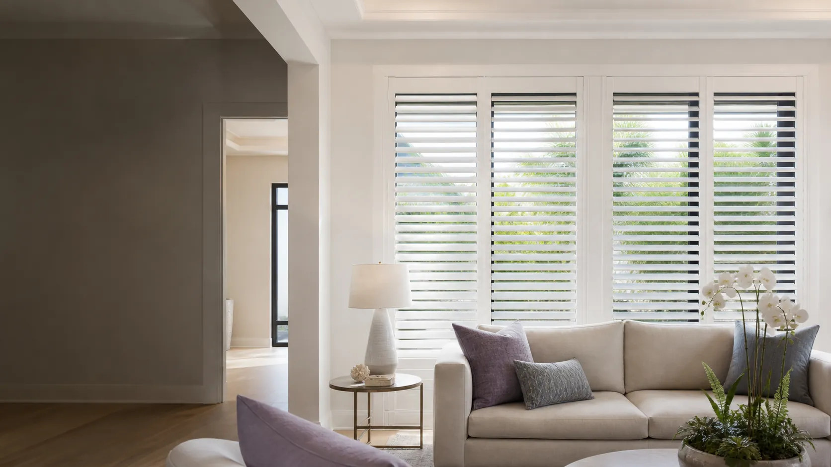 Custom white plantation shutters in a modern upscale Nocatee home